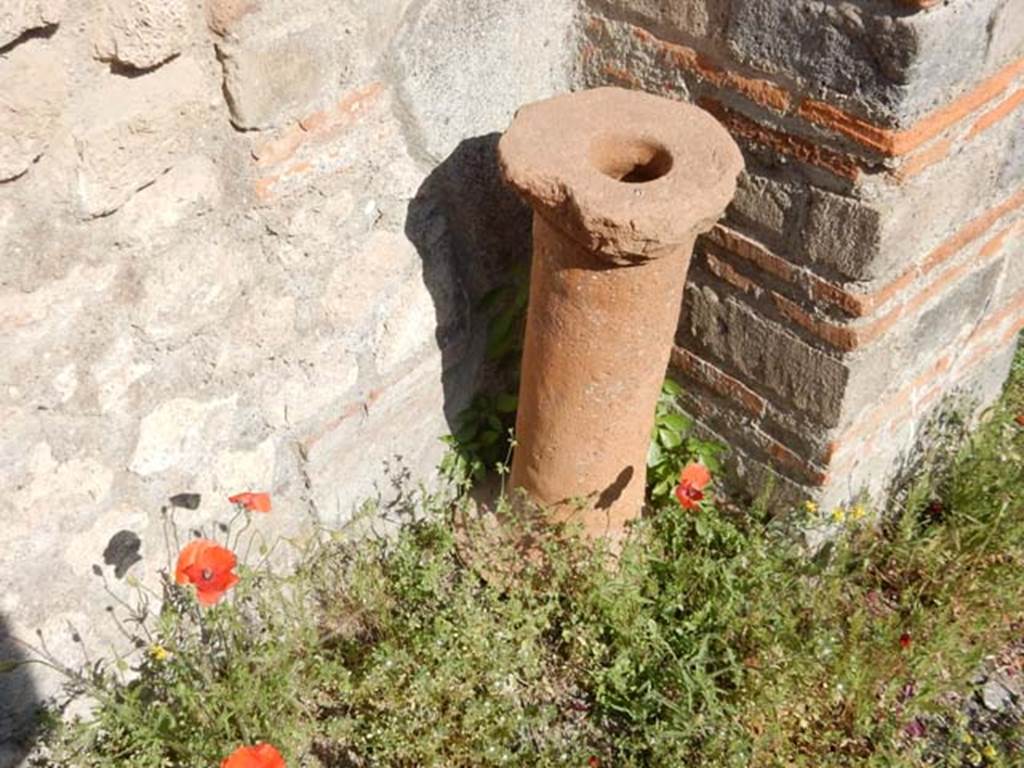 VIII.5.37 Pompeii. May 2017. Room 10, terracotta object against east wall of tablinum. 
Photo courtesy of Buzz Ferebee.