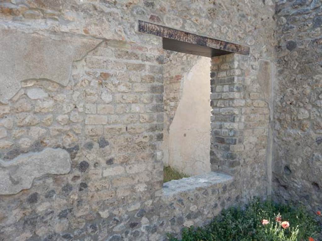 VIII.5.37 Pompeii. May 2017. Looking west through window from garden area, into room 12. Photo courtesy of Buzz Ferebee.
