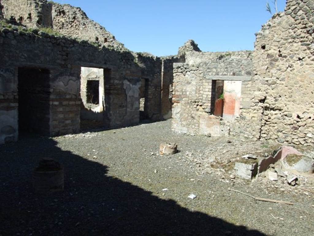 VIII.5.39 Pompeii. March 2009. North-west side of room 1 with doorways to rooms 3, 5 and 6.