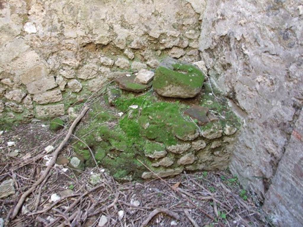VIII.5.39 Pompeii. March 2009. Room 3, remains of hearth or bench in south-west corner of kitchen.