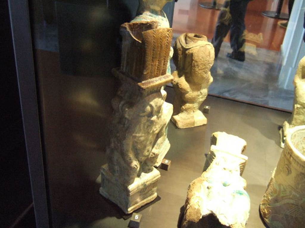 Statuette of Bes found in VIII.5.39, according to Naples Museum label. 
Now in Naples Archaeological Museum, inventory number 116665.