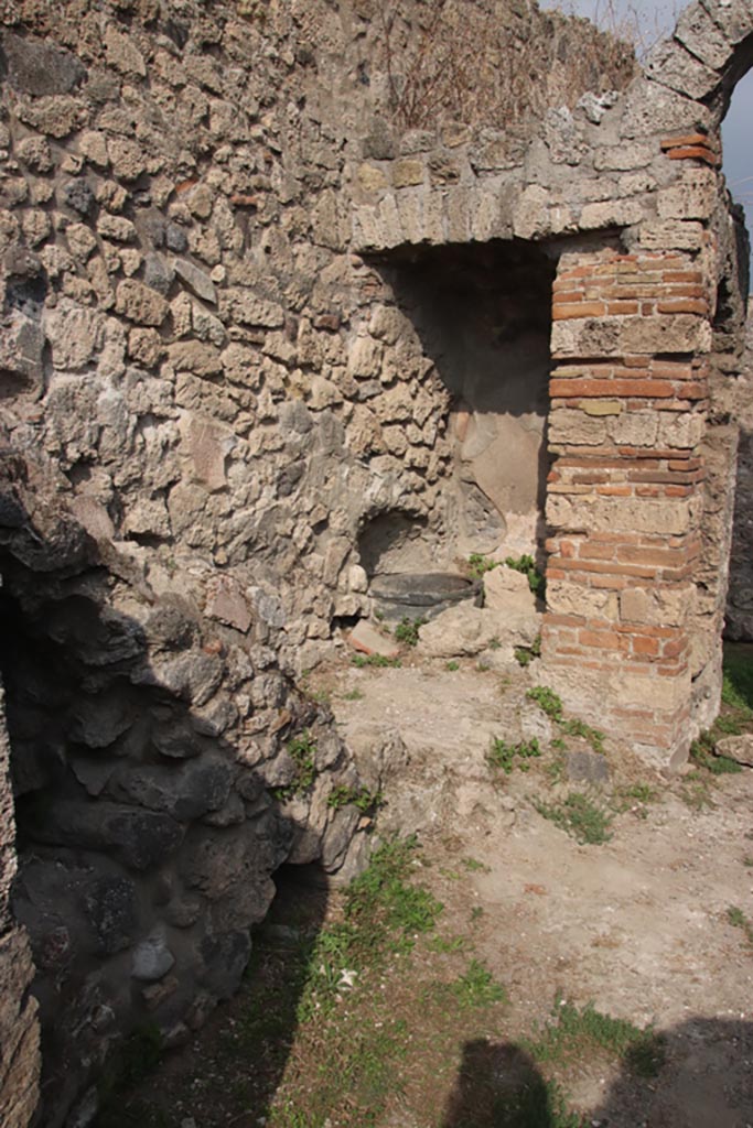VIII.6.3 Pompeii. October 2023. 
Room (d), looking north along west wall towards well (?), in room (e). Photo courtesy of Klaus Heese.