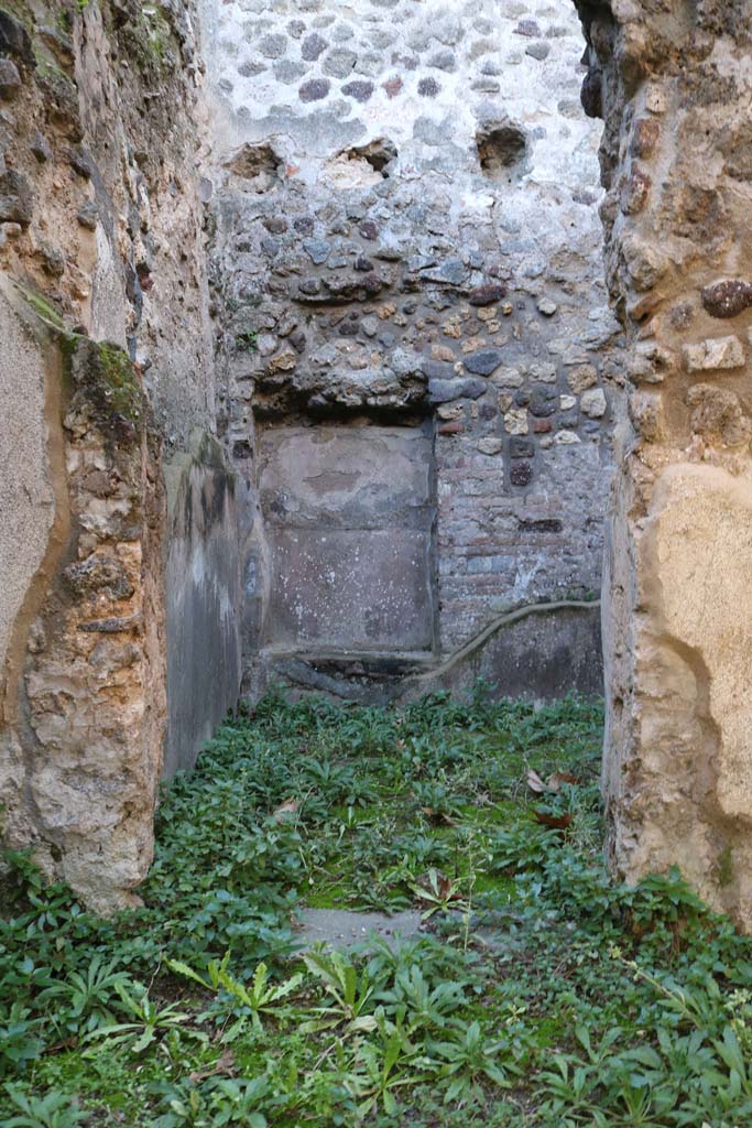 VIII.6.8 Pompeii. December 2018. 
Looking through doorway at recess in south wall of room opposite the entrance doorway.  
Photo courtesy of Aude Durand.