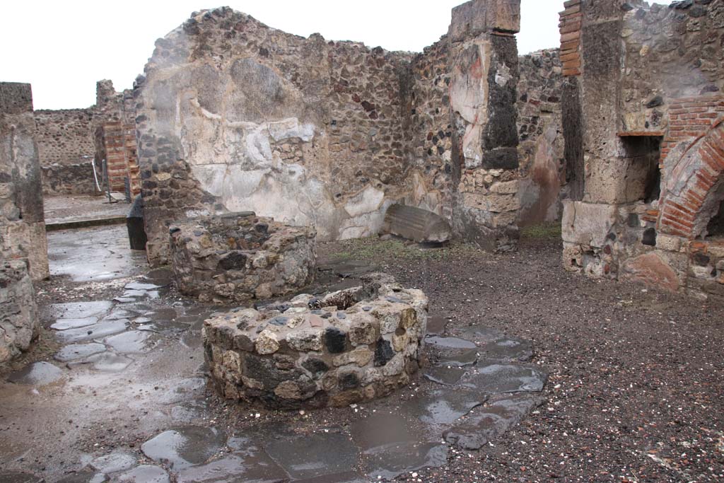 VIII.6.11 Pompeii. October 2020. 
Looking north towards doorway to room “k” and peristyle area, on left, and doorway to room “e” in north-east corner of bakery room. 
Photo courtesy of Klaus Heese.