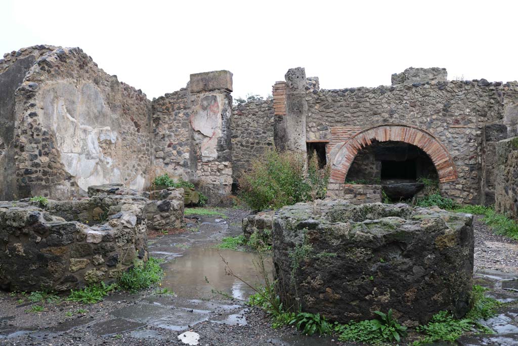 VIII.6.11, Pompeii. December 2018. 
Looking north-east across bakery room, with room “k”, on extreme left, and room “e”, in centre. Photo courtesy of Aude Durand.