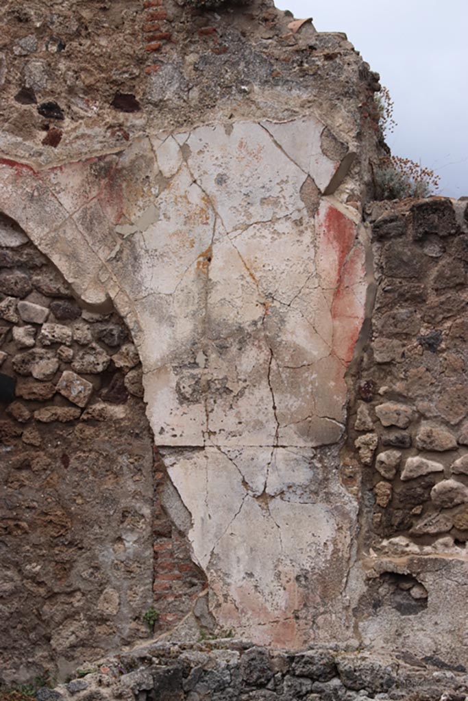 VIII.6.11 Pompeii. May 2024. 
Detail of remaining painted decoration on north wall of bakery room. Photo courtesy of Klaus Heese.