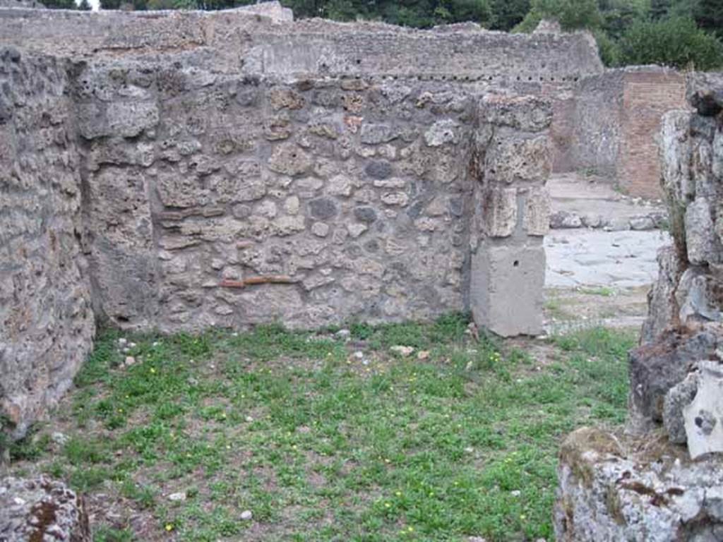 VIII.7.5 Pompeii. September 2010. Looking east from doorway from atrium, towards road. Photo courtesy of Drew Baker.