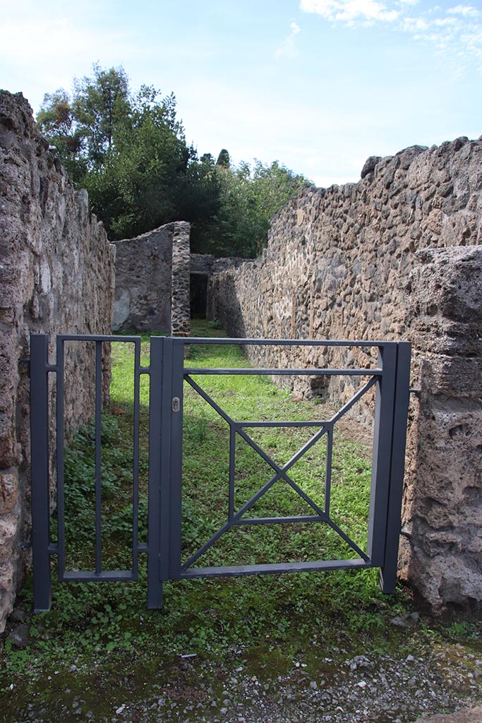 VIII.7.6 Pompeii. October 2024. 
Looking west through entrance doorway. Photo courtesy of Klaus Heese.