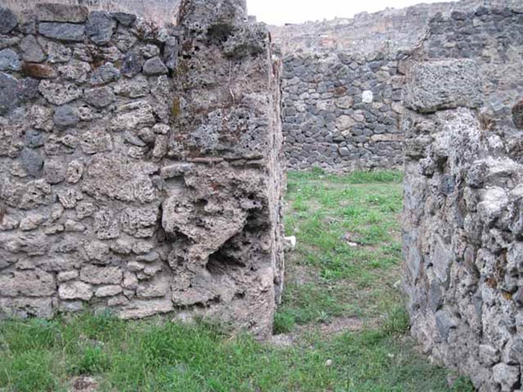 VIII.7.6 Pompeii. September 2010. Looking north from “rustic” room through doorway into atrium. Photo courtesy of Drew Baker.