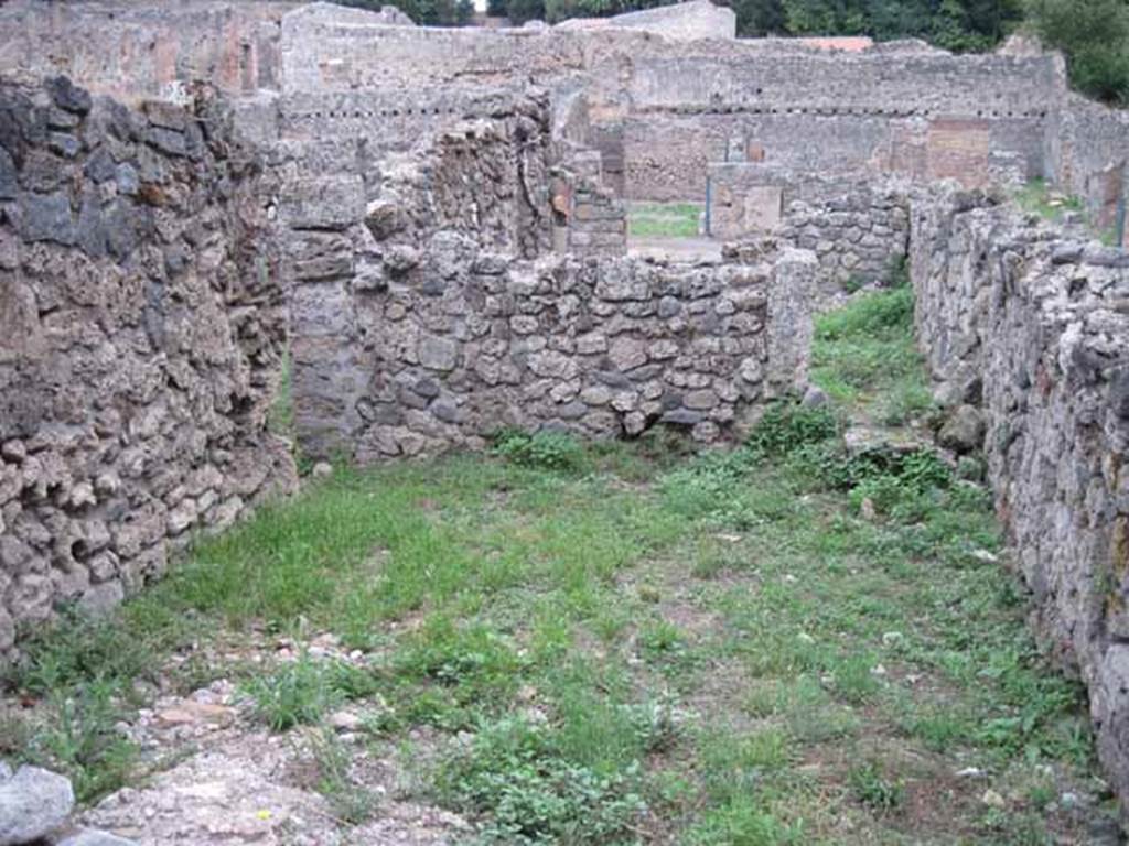 VIII.7.6 Pompeii. September 2010. Looking east from rear of “rustic” room, looking towards workshop at VIII.7.5 and Via Stabiana. Photo courtesy of Drew Baker.
