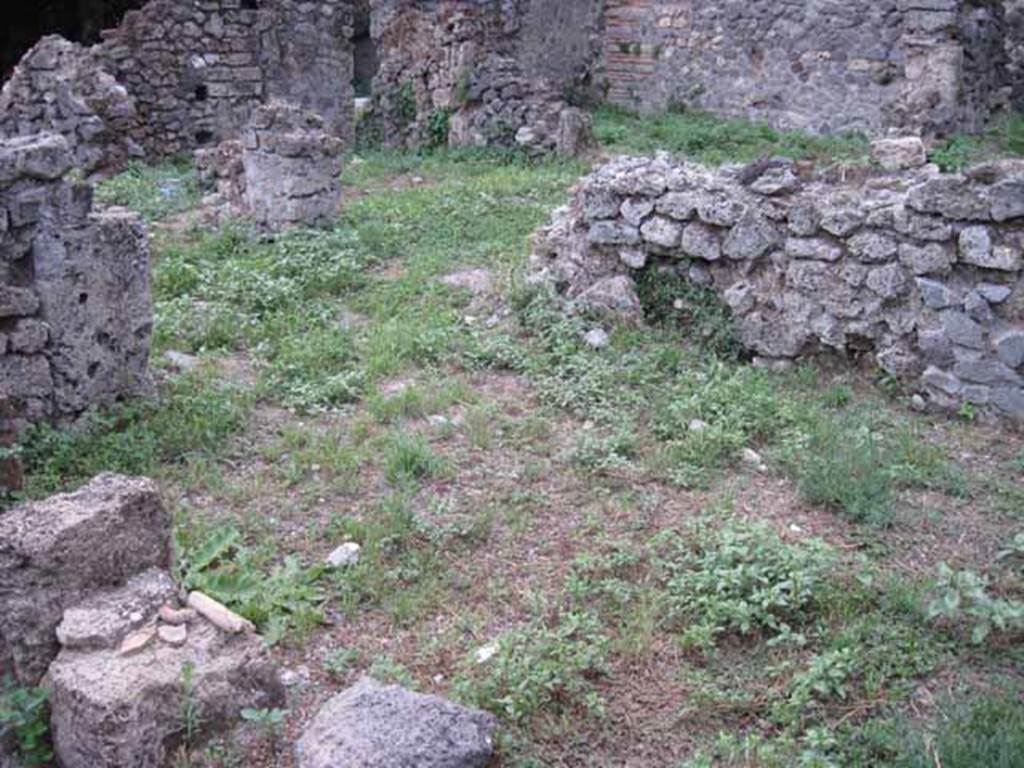 VIII.7.11 Pompeii. September 2010. Looking south-west from kitchen, across corridor and small room at rear of triclinium, towards garden area.
Photo courtesy of Drew Baker.