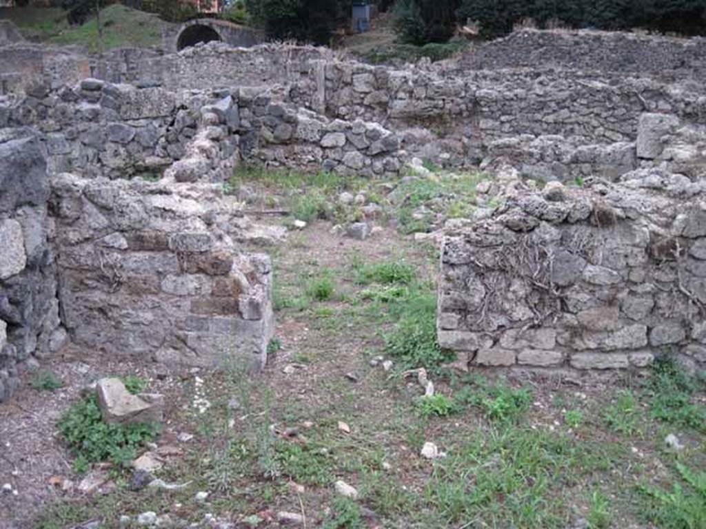 VIII.7.12 Pompeii. September 2010. Doorway from triclinium fenestratum in south wall, looking south into corridor. Across the corridor would have been the doorway to the cubiculum. Photo courtesy of Drew Baker.