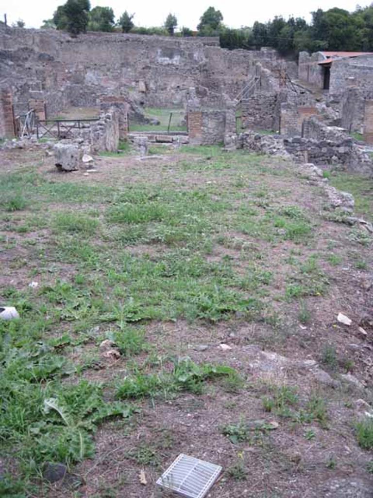 VIII.7.14 Pompeii. September 2010. Looking east to road, from rear garden or yard. Photo courtesy of Drew Baker.