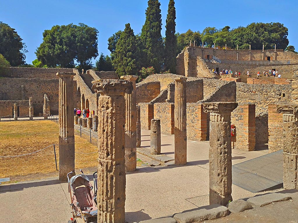 VIII.7.16 Pompeii. September 2024. 
Looking north-west towards the large theatre, from north-east corner. Photo courtesy of Giuseppe Ciaramella.