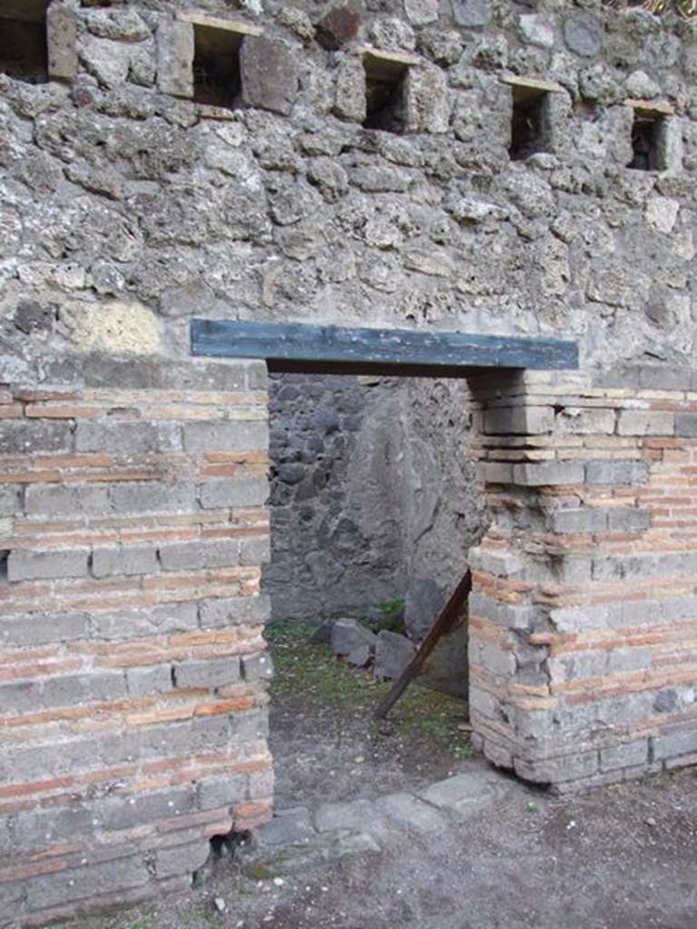 VIII.7.16 Pompeii.  December 2007. Room on west side.  Mau identifies this as a guard room.  A set of stocks for confining prisoners was found here.  
The skeletons of four persons who were not locked in the stocks at the time of the eruption were found here.  See Mau, A., 1907, translated by Kelsey F. W. Pompeii: Its Life and Art. New York: Macmillan. (p.163).