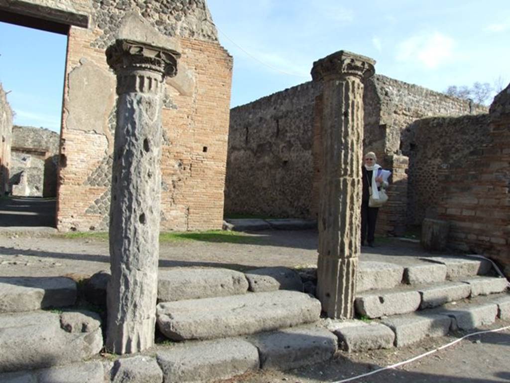VIII.7.16 Pompeii. December 2007.  Looking east in north-east corner showing, left to right,  -  the ends of corridors from entrances VIII.7.17 and VIII.7.16, and the doorway to doorkeeper’s room.