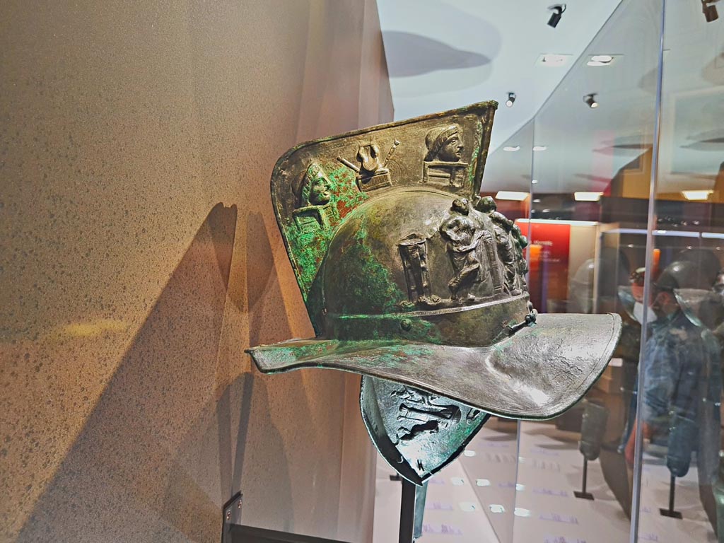 VIII.7.16 Pompeii. Murmillo helmet found March 23rd, 1863, in quadriporticus. Side 1. 
Photo taken May 2021, courtesy of Giuseppe Ciaramella.