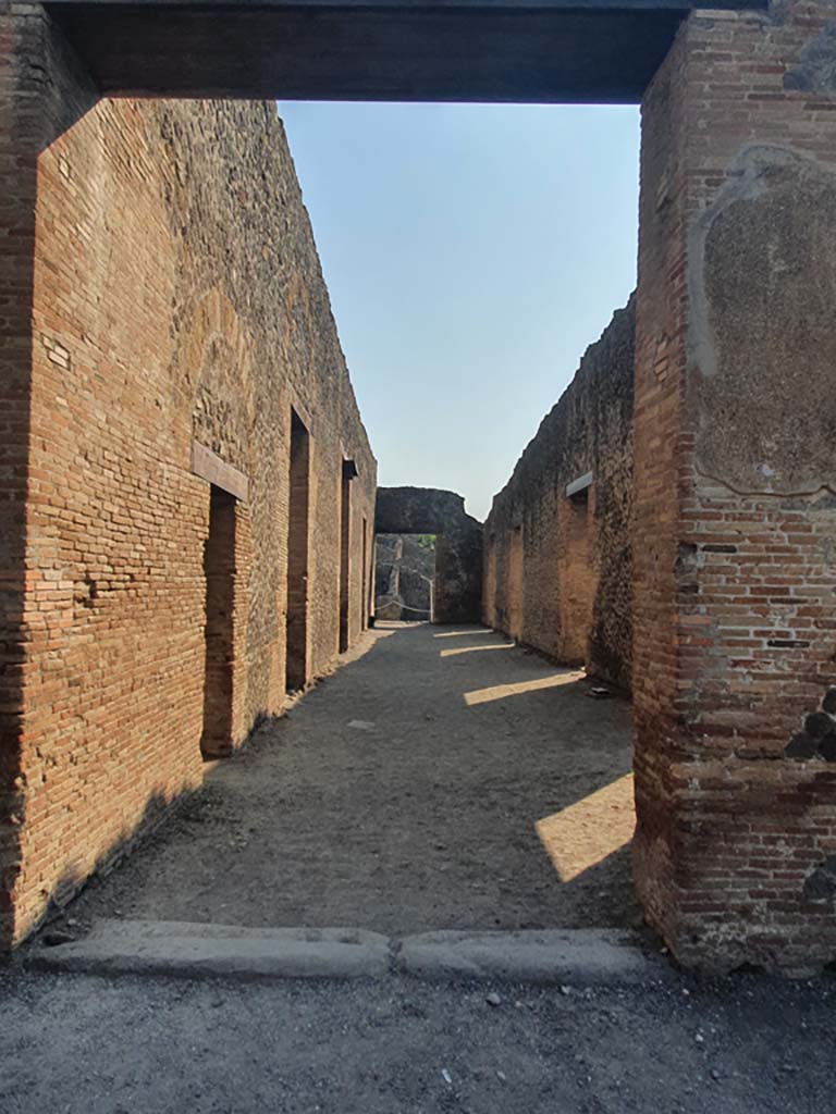 VIII.7.17 Pompeii. July 2021. Looking east from Gladiators’ Barracks to entrance on Via Stabiana. 
Foto Annette Haug, ERC Grant 681269 DÉCOR.