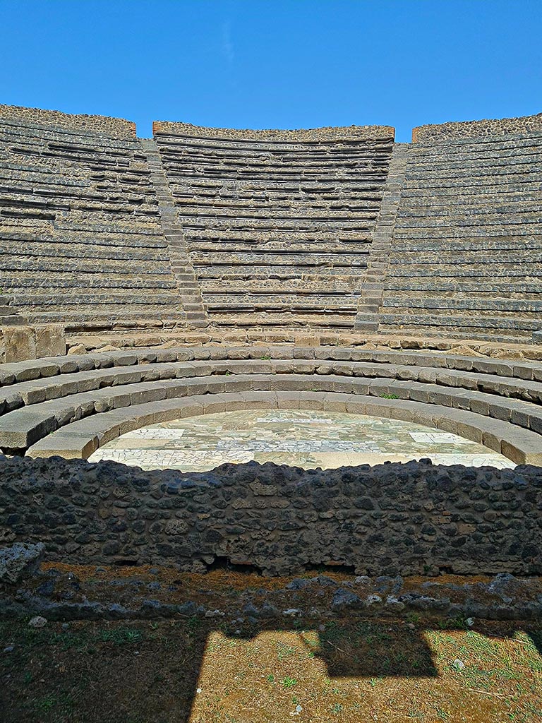 VIII.7.19/18 Pompeii. September 2024. 
Looking towards seating on north side, from stage. Photo courtesy of Giuseppe Ciaramella.