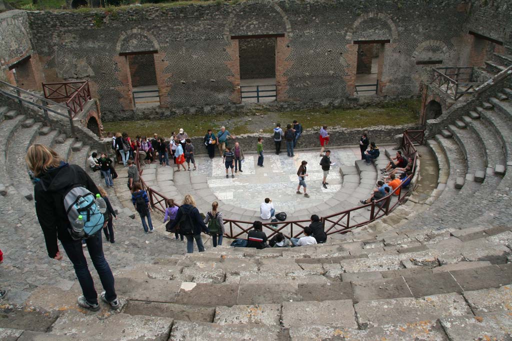 VIII.7.19 Pompeii. April 2010. Looking south towards stage from top of Little Theatre/Odeon.
Photo courtesy of Klaus Heese.
