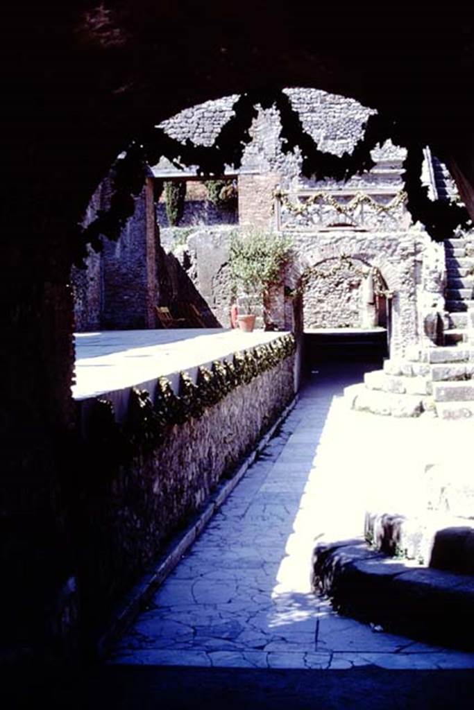 VIII.7.19 Pompeii. 1968. Looking west across Theatre decorated for a performance. Photo by Stanley A. Jashemski.
Source: The Wilhelmina and Stanley A. Jashemski archive in the University of Maryland Library, Special Collections (See collection page) and made available under the Creative Commons Attribution-Non Commercial License v.4. See Licence and use details.
J68f1070