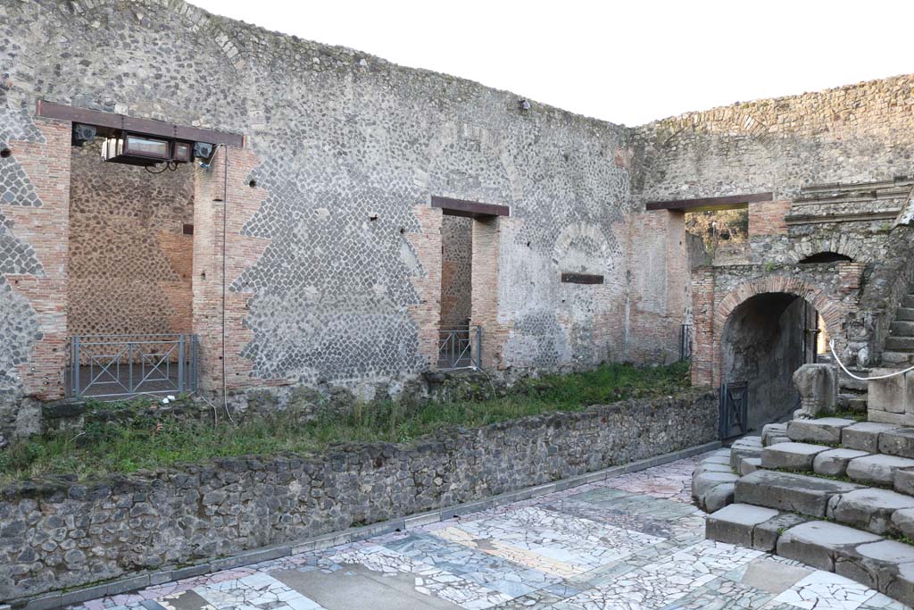 VIII.7.19 Pompeii. December 2018. 
Looking south-west towards stage and doorways to VIII.7.17, left and centre. Photo courtesy of Aude Durand.
