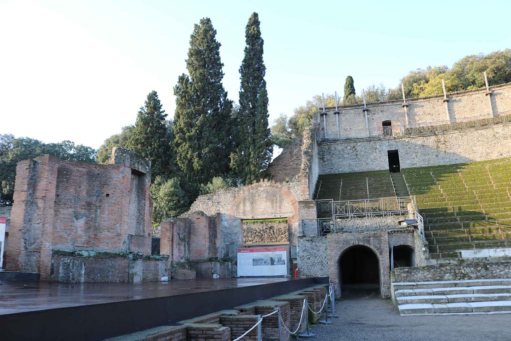 VIII.7.20 Pompeii. December 2018. 
Looking west across the Theatre to the Tribunal over the arched entrance/exit. Photo courtesy of Aude Durand.