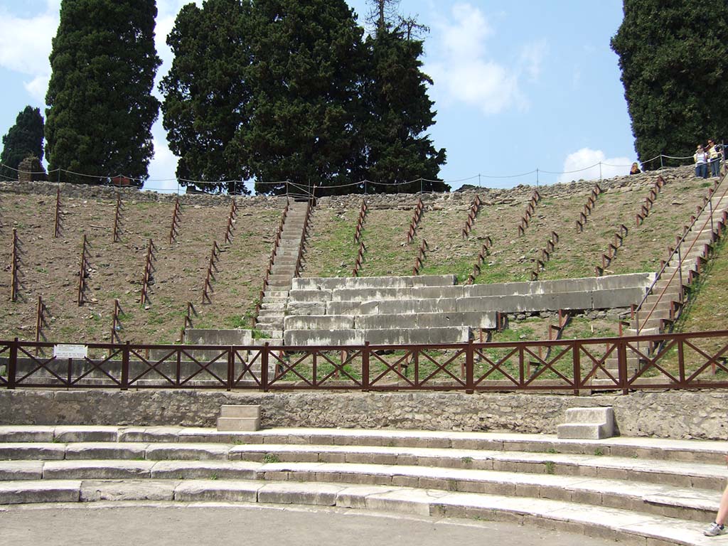 VIII.7.20 Pompeii. May 2006. Remains of seats in the media cavea.
