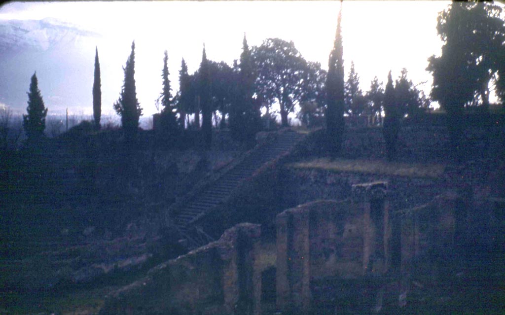 VIII.7.20 Pompeii. February 1952. Looking south-west across stage area of Large Theatre, towards steps leading to Triangular Forum.
Photo courtesy of John Vanko. His father took this photo in 1952, identical to the one above.