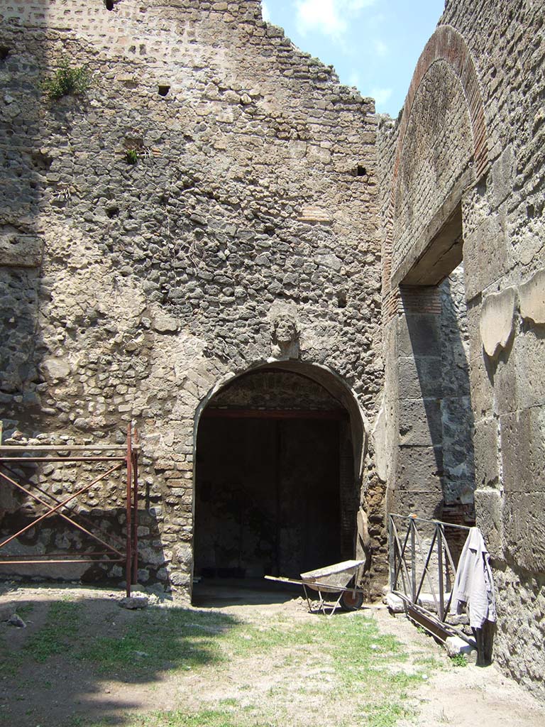 VIII.7.20 Pompeii. May 2006. 
West side. Entrance to room with entrance/exit from Theatre, under the seating.