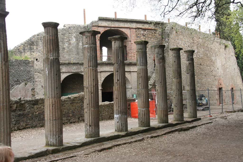 VIII.7.21 Pompeii. April 2010. Looking south-east towards portico at rear of Large Theatre, on east side of Triangular Forum. 
Photo courtesy of Klaus Heese.