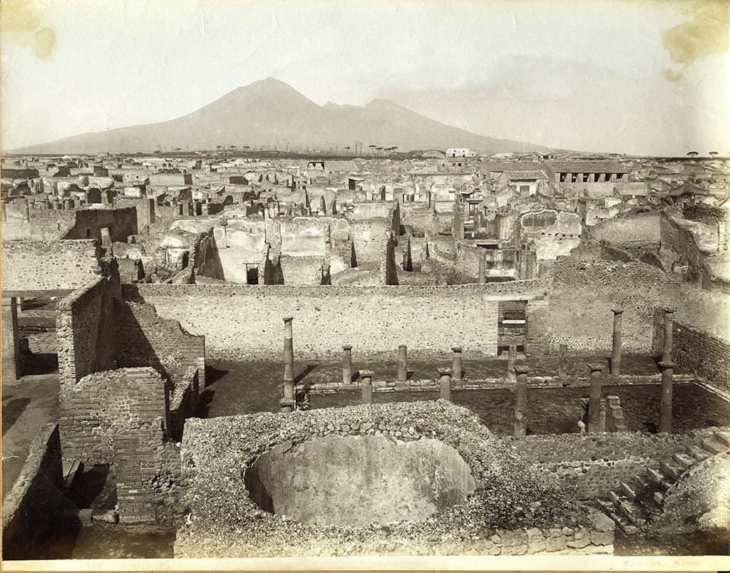 VIII.7.20/21 Pompeii. Looking north, across perfumed water tank at the rear of the Large Theatre, towards VIII.7.29, Samnite Palaestra.
Photograph No. 1285, by Giorgio Sommer, (1834-1914).  Public domain, via Wikimedia Commons