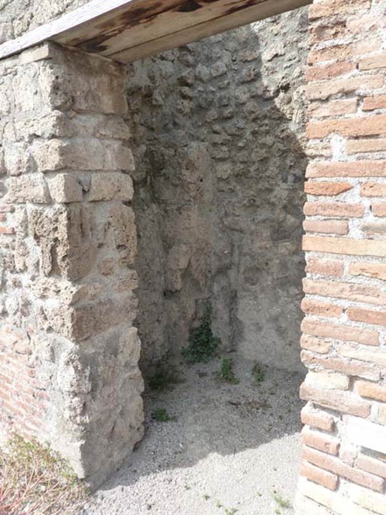 VIII.7.23 Pompeii. September 2015.  Doorway to small room or latrine. Looking north-west.