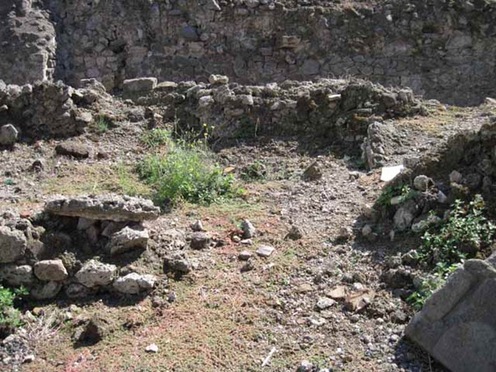 VIII.7.23 Pompeii. September 2010. Doorway to kitchen on south side of shop. Looking south. Photo courtesy of Drew Baker.