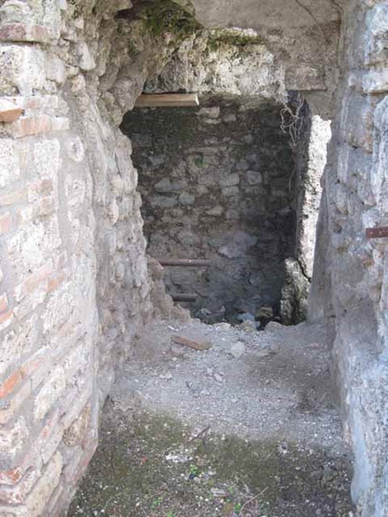VIII.7.24 Pompeii. September 2010. Looking west in first room in south-east corner of atrium, towards storage room. Photo courtesy of Drew Baker.