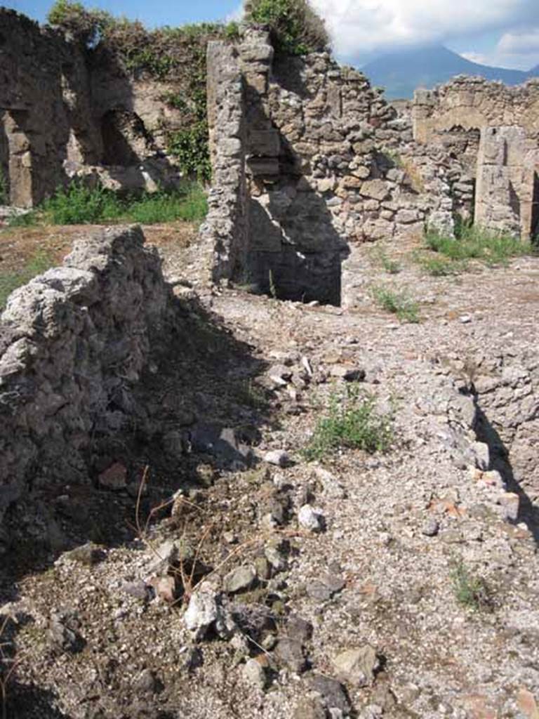 VIII.7.24 Pompeii. September 2010. Looking north along western portico of garden at mid point (collapsed). Photo courtesy of Drew Baker.