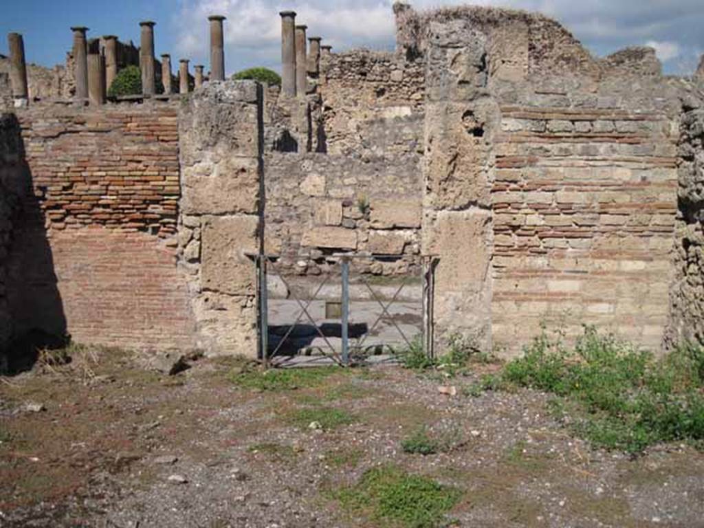 VIII.7.26 Pompeii. September 2010. North wall of main entrance room, looking north onto Via del Tempio d'Iside. Photo courtesy of Drew Baker.