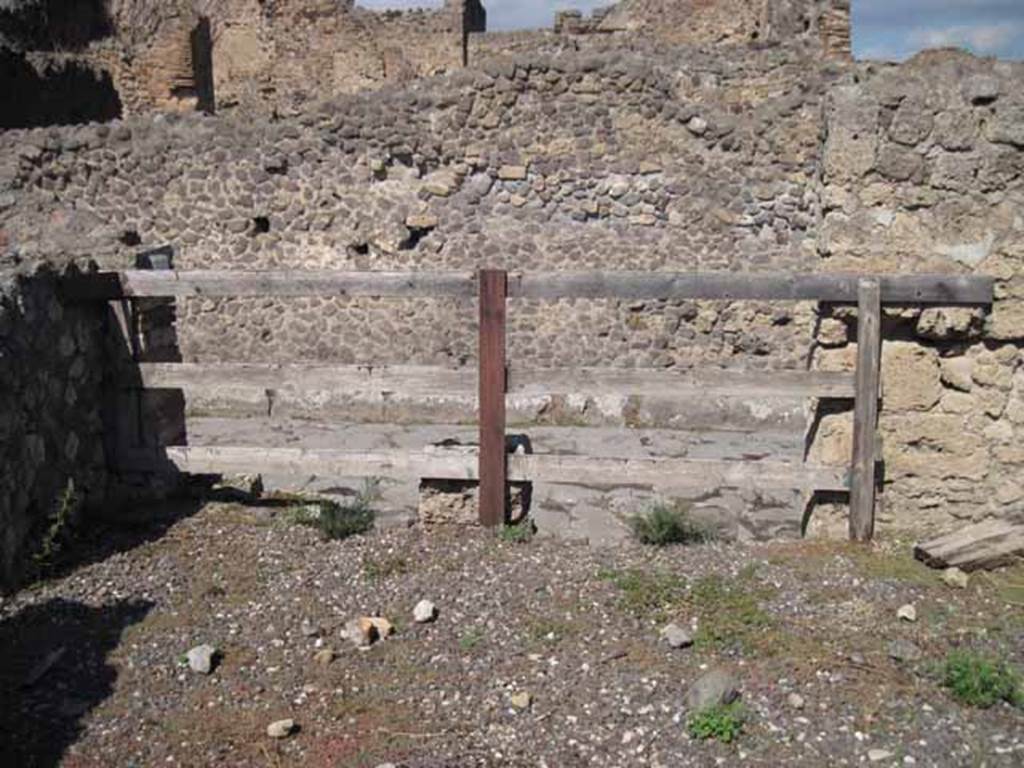 VIII.7.26 Pompeii. September 2010. Looking north across first room on the east onto Via del Tempio d’Iside. Photo courtesy of Drew Baker.