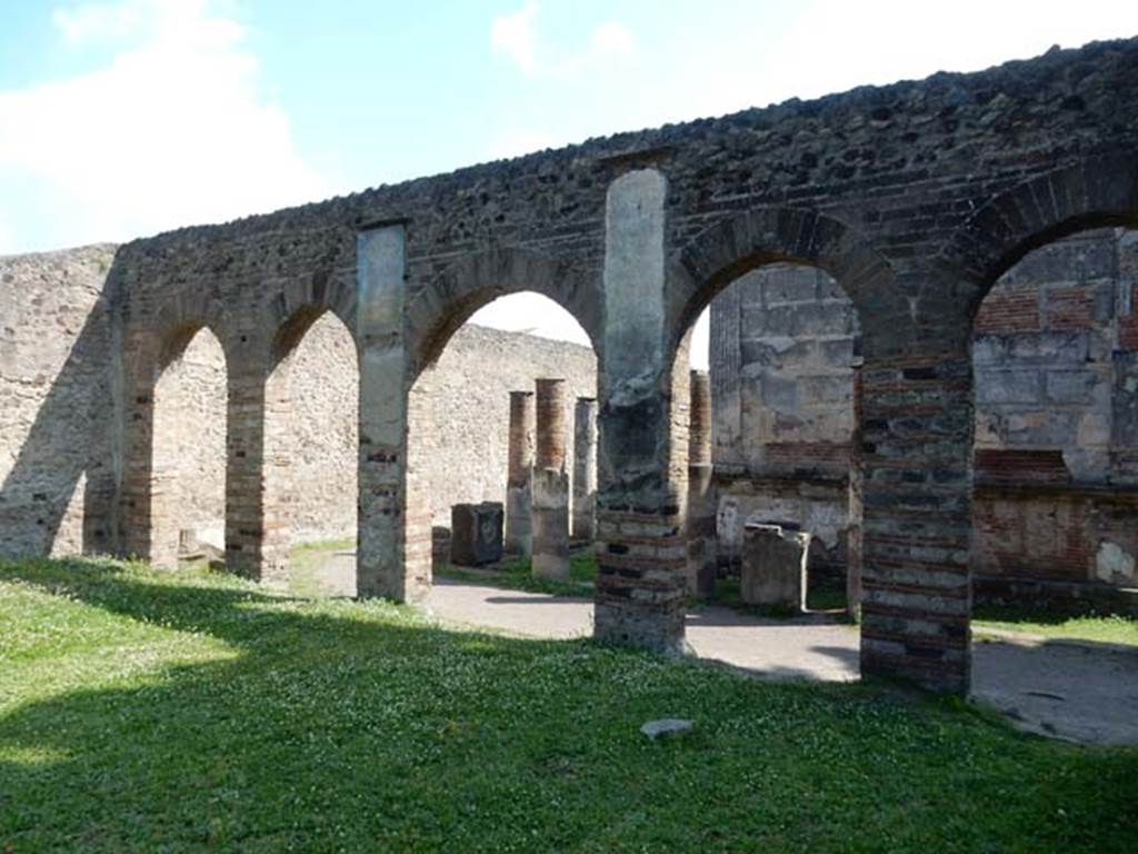 VIII.7.28, Pompeii. May 2015. Looking out through the arches of the Ekklesiasterion on to the west portico and north portico. 
Photo courtesy of Buzz Ferebee.