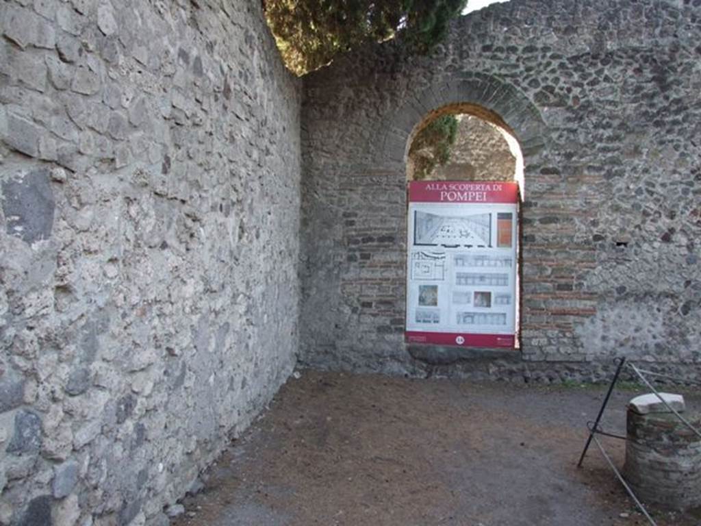 VIII.7.28 Pompeii. December 2007. South-west corner of portico.
In the south-west corner of the portico, on the west wall, a statue of Venus Anadyomene was found. 
In the same corner on the south wall stood the herm of Gaius Norbanus Sorex.
The arched entrance leads to an irregular shaped sacred room.
