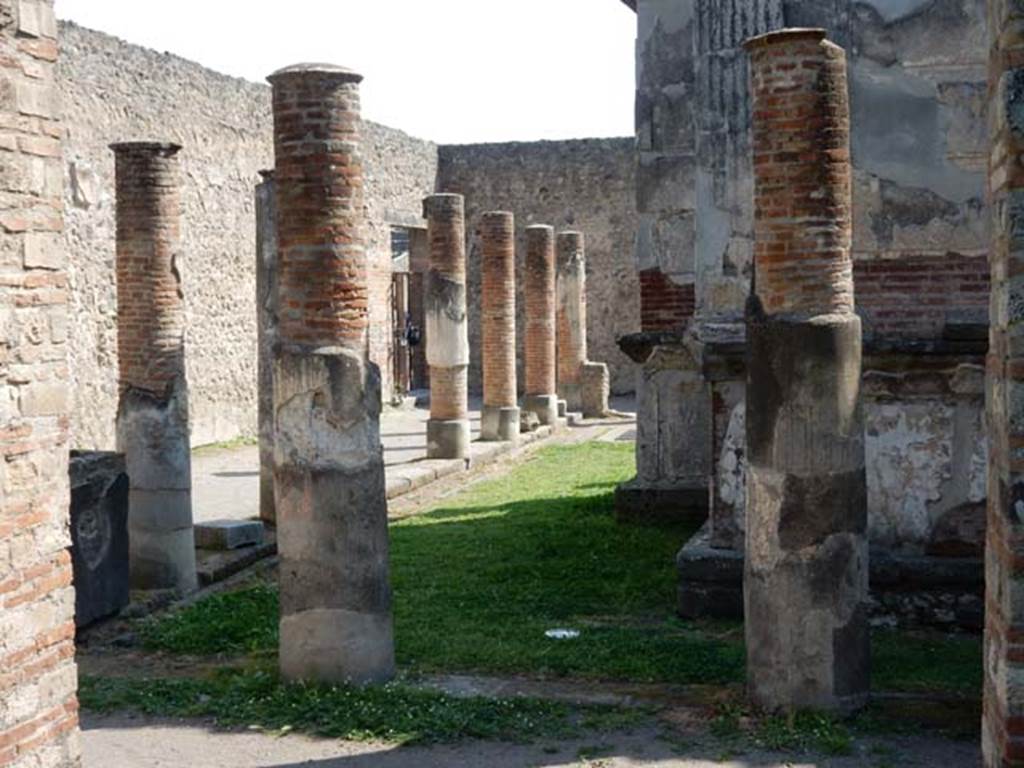VIII.7.28, Pompeii. May 2015. Looking east along north portico, towards entrance doorway. 
Photo courtesy of Buzz Ferebee.
