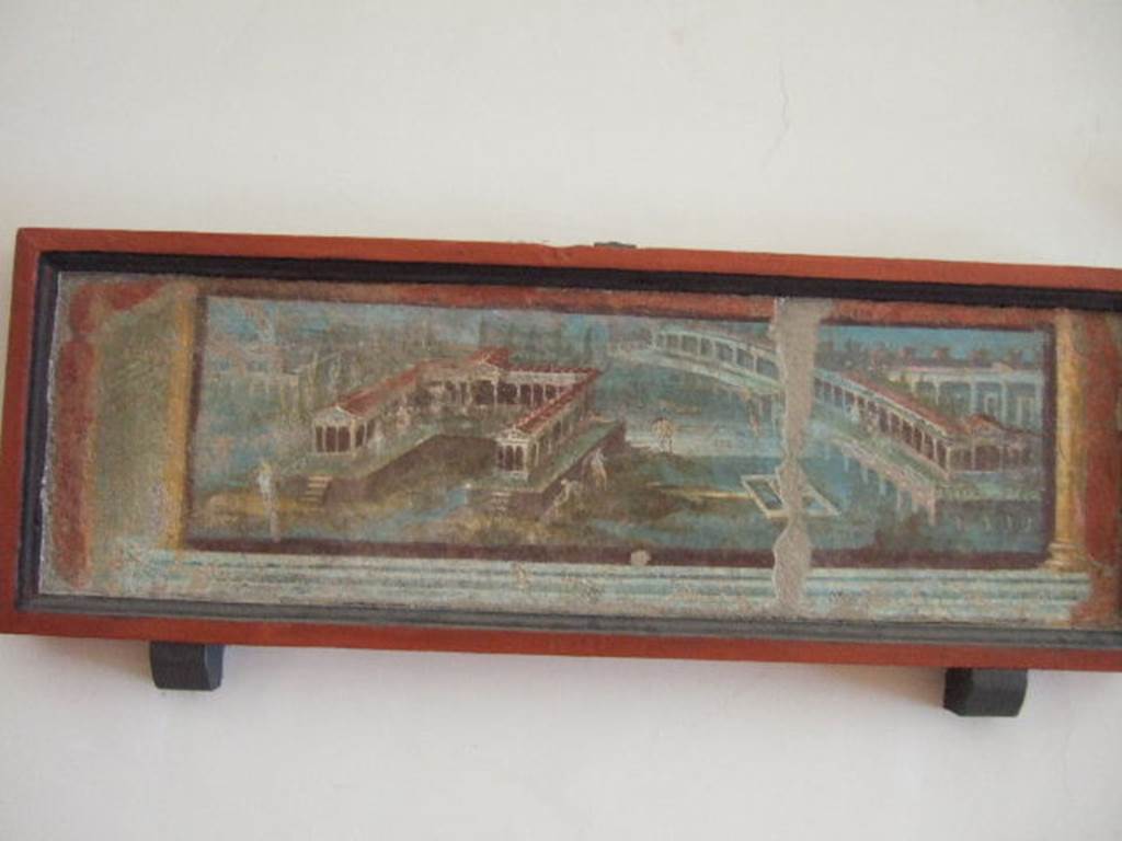 VIII.7.28 Pompeii. Centre of north portico, immediately east of the centre panel (8519).
Marine landscape with a three-sided villa and long porticoed building. 
Now in Naples Archaeological Museum. Inventory number 9505.