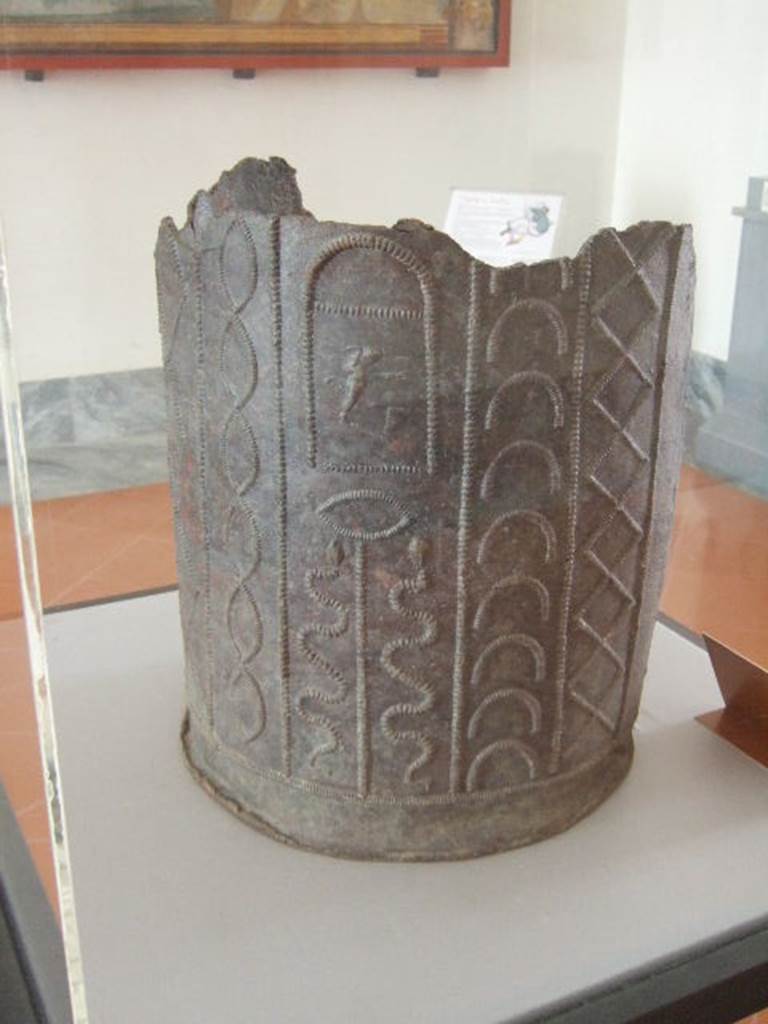 VIII.7.28 Pompeii.  Water container decorated with themes of Isis.  
Found in the north-east corner of the portico.  Now in Naples Archaeological Museum.