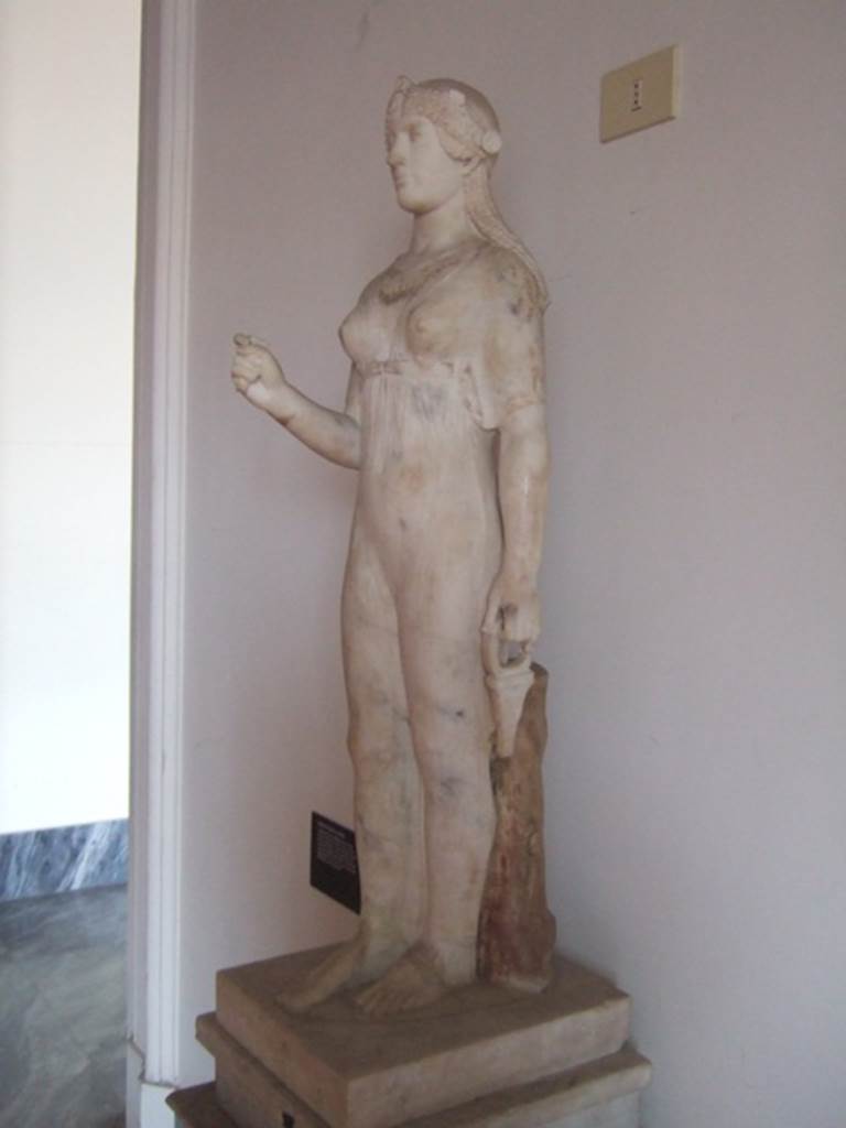 VIII.7.28 Pompeii.  Marble statue of Isis found in the north east corner of the portico. Now in Naples Archaeological Museum. Inventory number 9976.