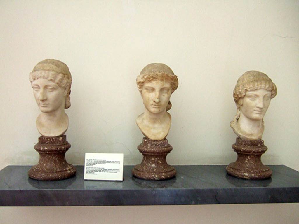 VIII.7.28 Pompeii. Three marble busts of women found in the Sacrarium. 
Now in Naples Archaeological Museum. Inventory numbers 6285, 6284 and 6289.