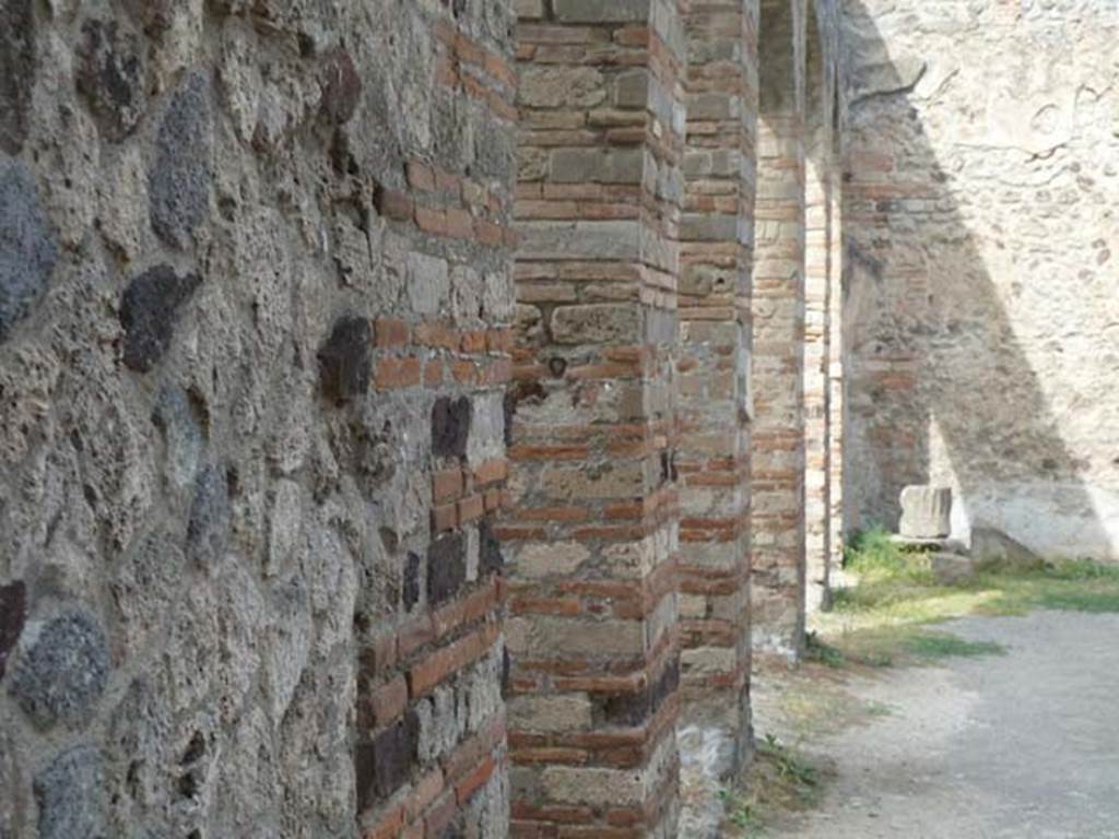 VIII.7.28 Pompeii. September 2015. Looking north along west portico past the 5 arches of the Ekklesiasterion.