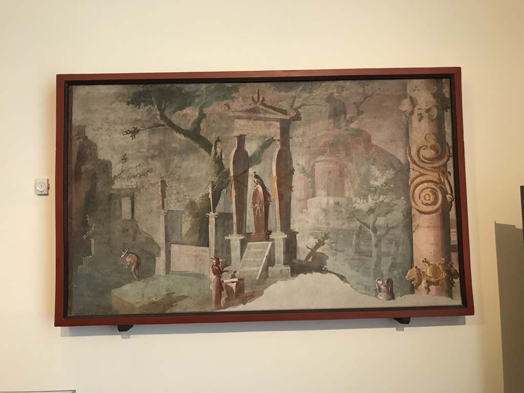 VIII.7.28 Pompeii. April 2019. Painting of the ceremony of mourning and sacrifice for Osiris.
Painted panel from the east end (left) of the south wall of the Ekklesiasterion.
This shows offerings being made in front of the sarcophagus of Osiris in the centre.
Now in Naples Archaeological Museum. Inventory number 8570.
Photo courtesy of Rick Bauer.