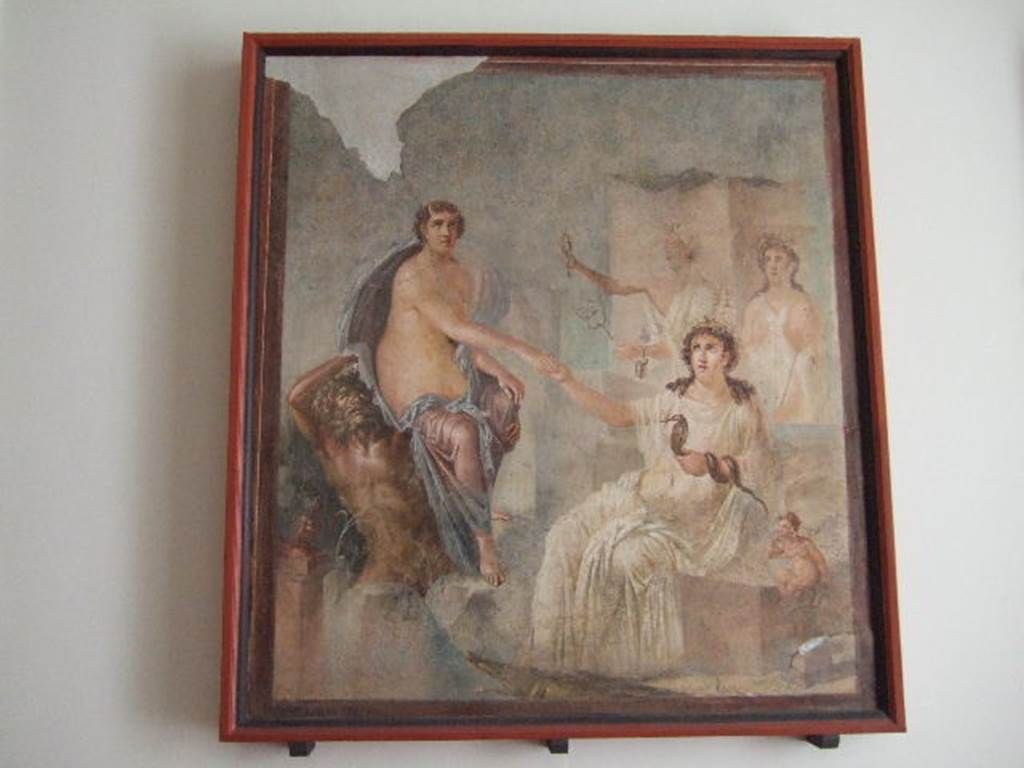 VIII.7.28 Pompeii. Arrival of Io, still horned, but now in the care of a sea deity, at Canopus. 
Isis offers her hand as her priestesses shake their sistra. 
Found in the centre of the south wall of the Ekklesiasterion in November 1765. 
Now in Naples Archaeological Museum. Inventory number 9558.