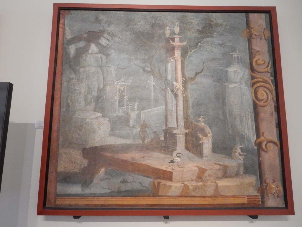 VIII.7.28 Pompeii. June 2019. 
Painting of rocky landscape with little temples, statue, fisherman and ibis, found on the left area of the north wall of Ekklesiasterion.
Photo courtesy of Buzz Ferebee.