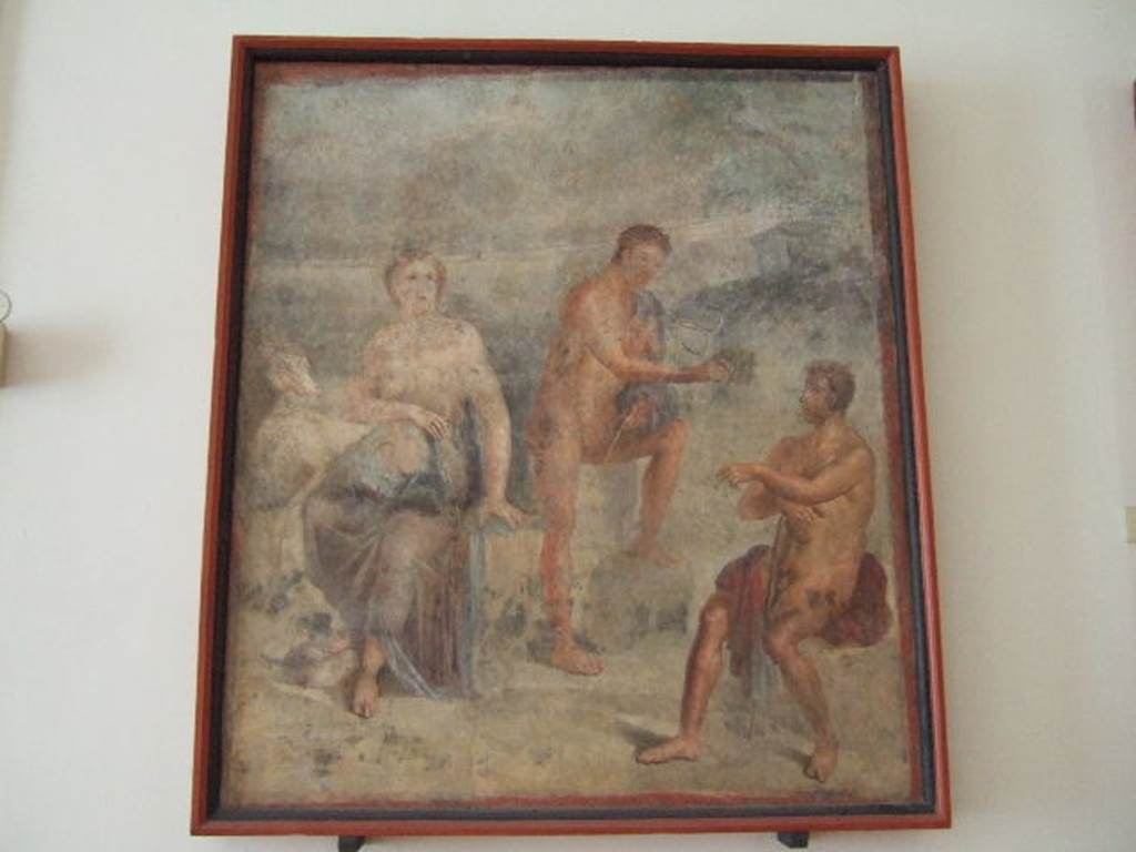 VIII.7.28 Pompeii. Found in the centre of the north wall of the Ekklesiasterion. 
Wall painting of Io shown with horns guarded by Argus to whom Hermes is showing his syrinx. 
Now in Naples Archaeological Museum. Inventory number 9548.